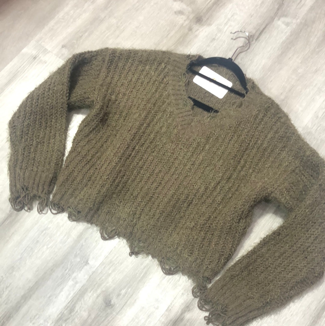 Cropped and destroyed sweater
